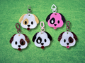 Colorful Adorrible Emoji Dog Keychain featuring a playful dog face with expressive emoji-style eyes and a vibrant design.