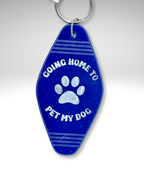 Adorrible dog lover motel keychain featuring a cute dog design on a metal keyring. Perfect for pet enthusiasts.