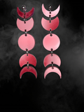 Silver moon phases earrings by Adorrible featuring a celestial design with crescent and full moon motifs.