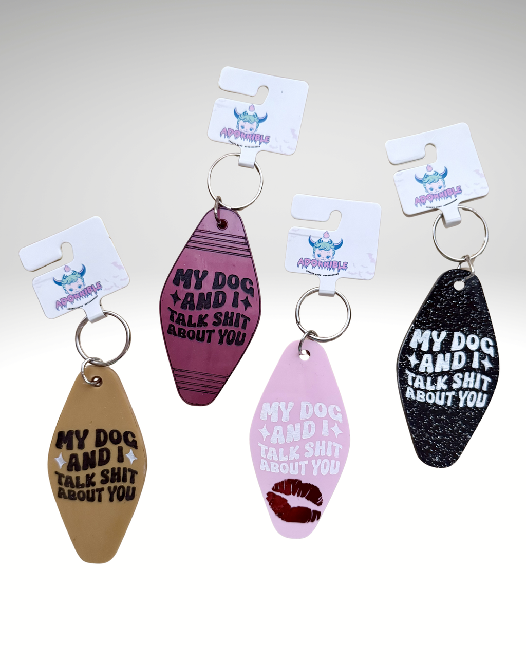Adorrible dog lover motel keychain with a detailed dog and motel design on a metal keyring.