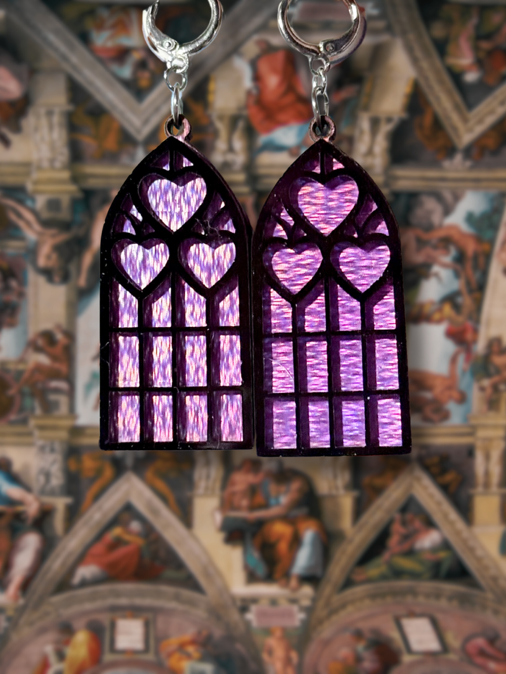 Adorrible Cathedral of Love acrylic dangle earrings featuring colorful, artistic design on silver hooks for women.