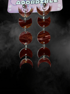 Adorrible moon phases earrings featuring silver-tone crescent and full moon designs on fishhook earrings.
