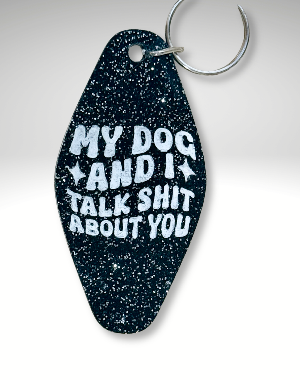 Adorrible dog lover motel keychain featuring a cute dog design on a small metal keyring.