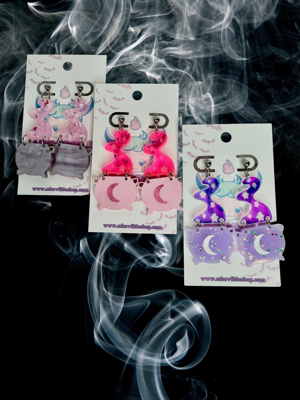 Adorrible Witch’s Cauldron Earrings featuring small black cauldrons with silver handles, perfect for mystical or gothic jewelry styles.