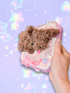 Adorrible plushie mounted taxidermy wall hanging showing a soft, colorful stuffed animal mounted like traditional taxidermy art.