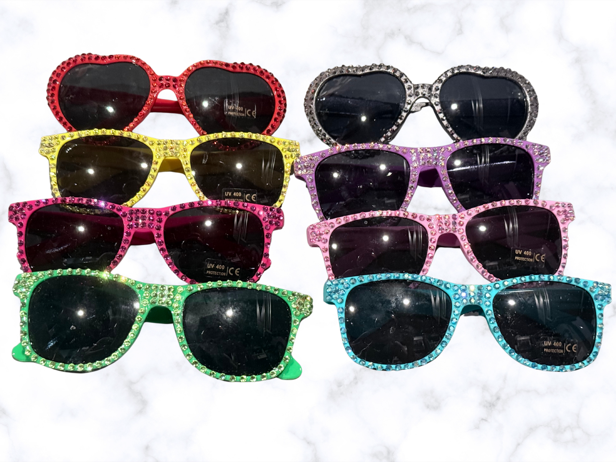 Stylish Adorrible rhinestones sunglasses with sparkling accents and dark tinted lenses, perfect for fashion-forward looks.