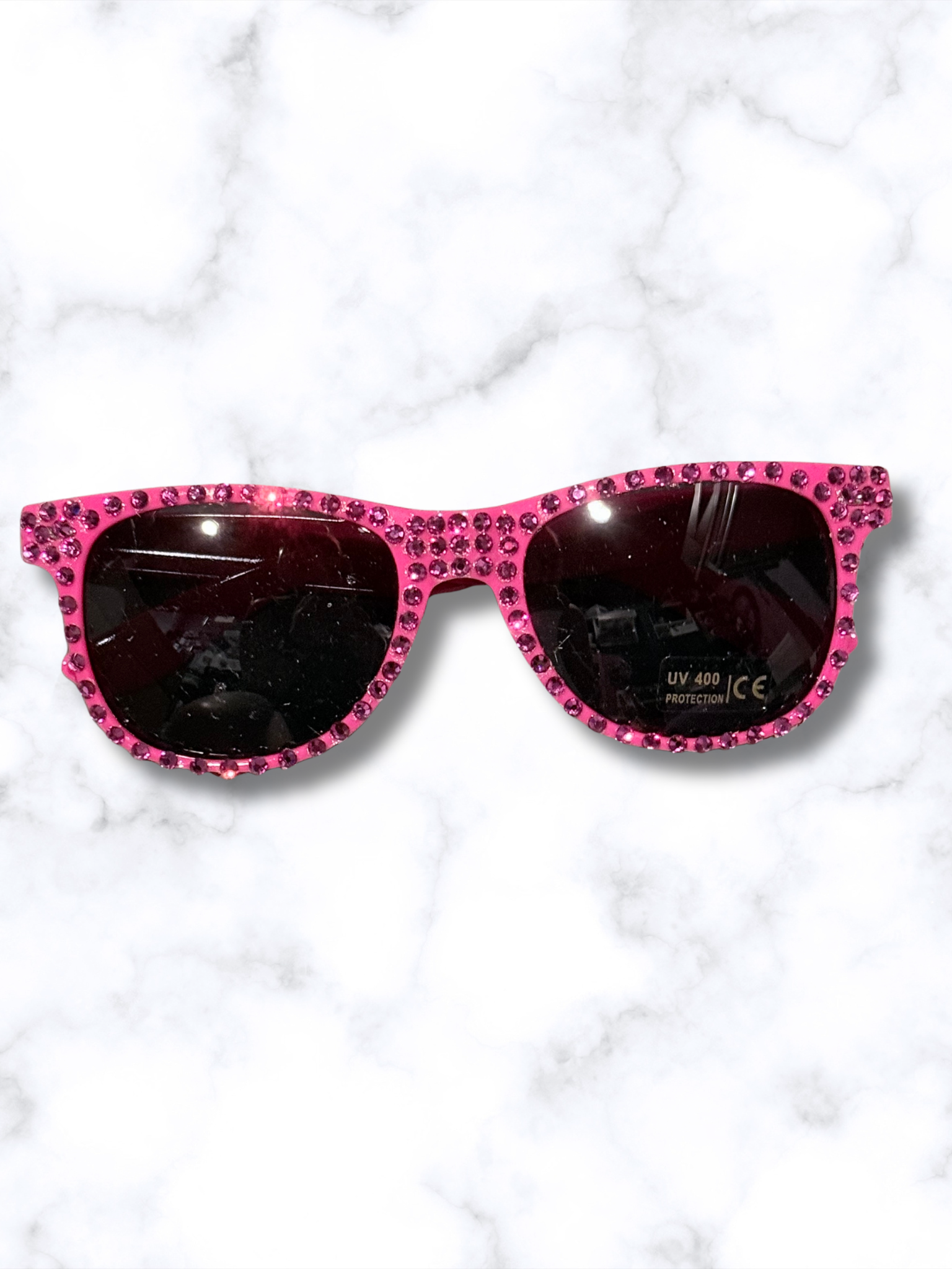 Adorrible rhinestones sunglasses with sparkling embellished frames and dark tinted lenses, stylish accessory for fashion-forward looks.