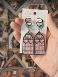 Adorrible Cathedral of Love acrylic dangle earrings featuring colorful, intricate cathedral design on lightweight earrings.