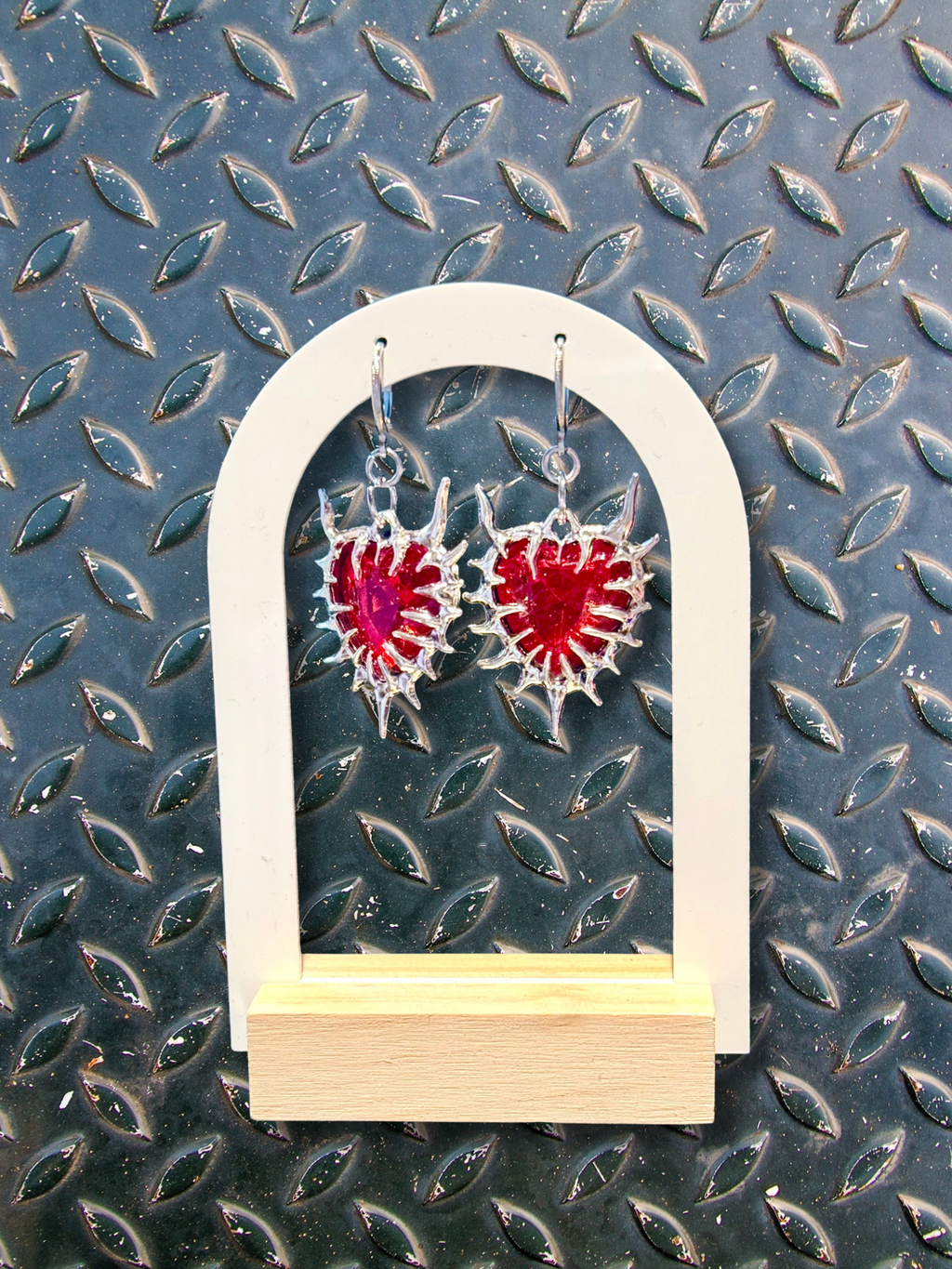 Adorrible Thorny Heart Gem Earrings featuring intricate heart-shaped design with sparkling gemstones on silver hooks.