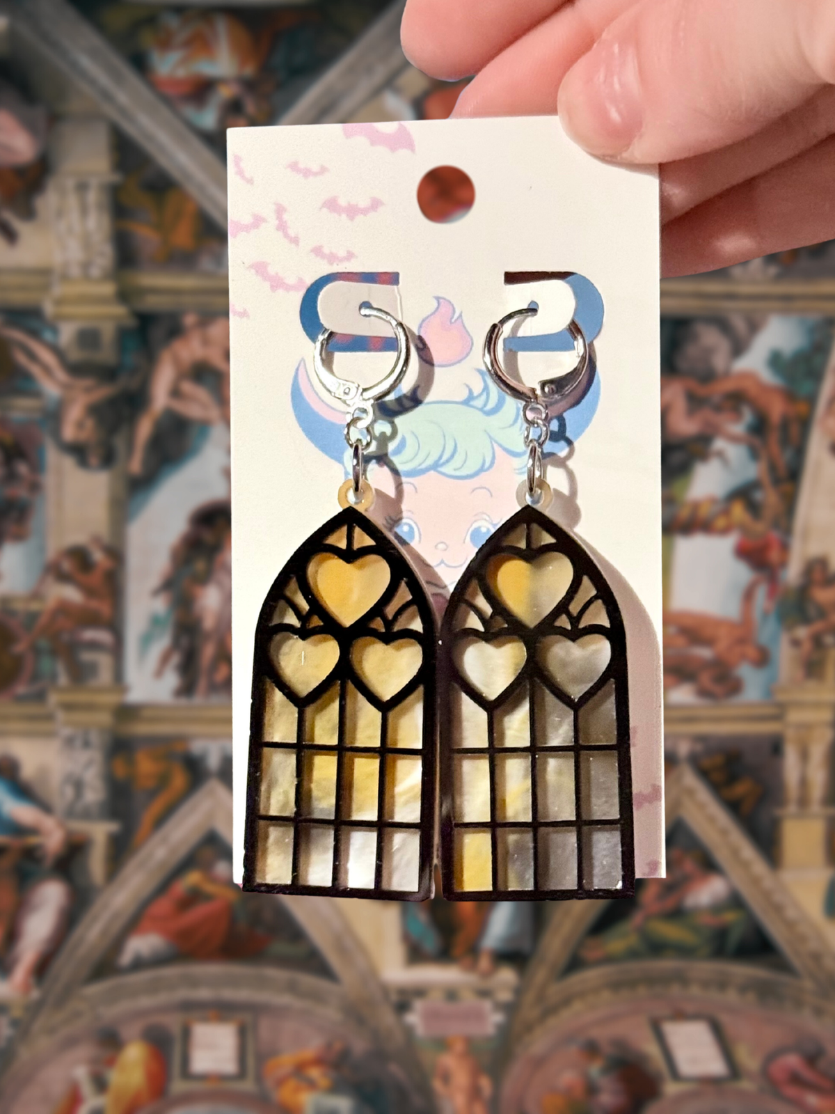 Adorrible Cathedral of Love acrylic dangle earrings with intricate design, featuring vibrant colors and lightweight material.