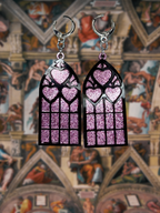 Adorrible Cathedral of Love acrylic dangle earrings with intricate design and vibrant colors, hanging from silver hooks.