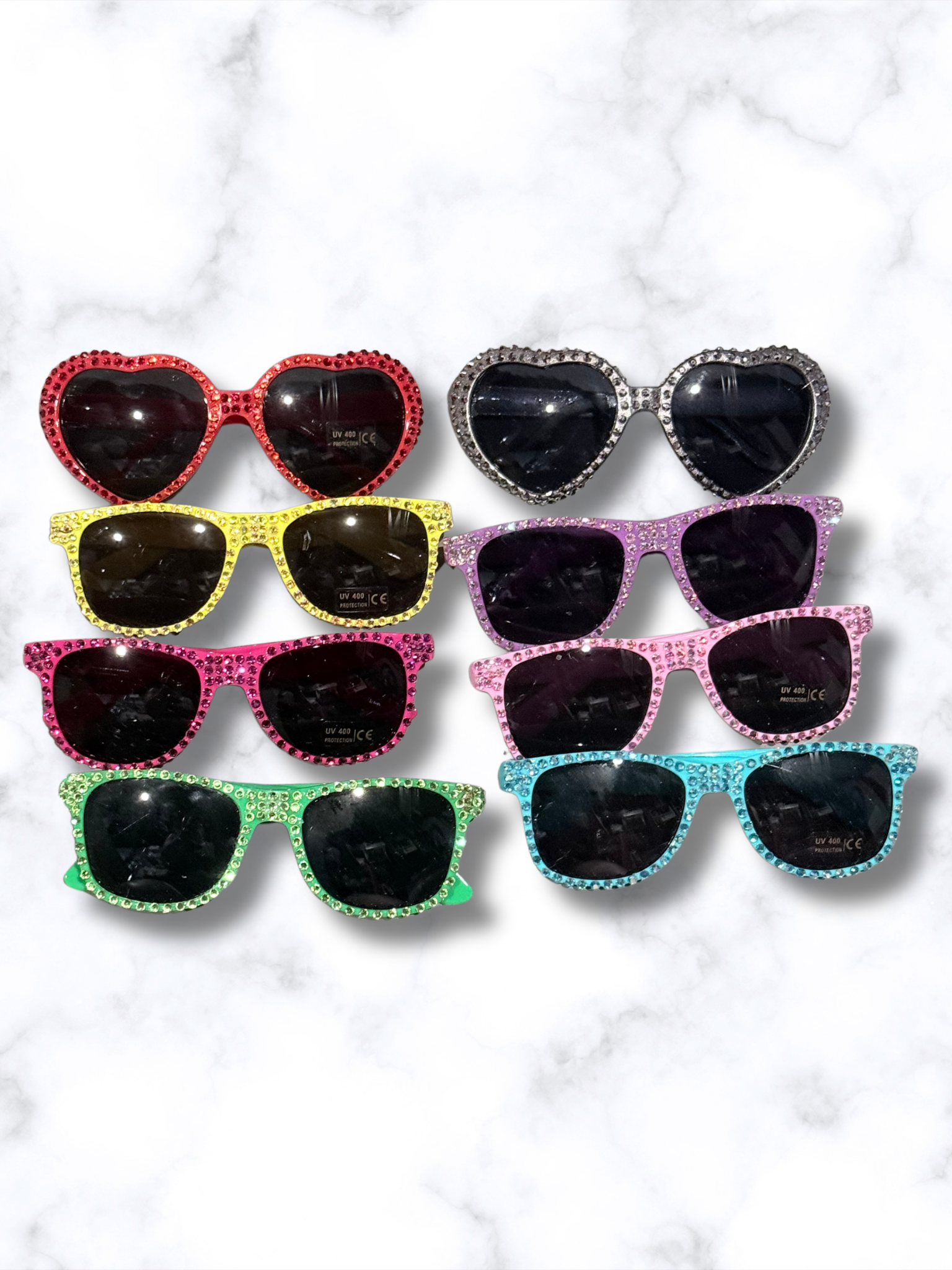 Adorrible rhinestones sunglasses with sparkling crystal-studded frame and dark tinted lenses for stylish eye protection.