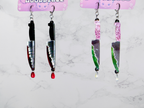 Silver layered dagger earrings featuring bloody knife design by Adorrible, showcasing dangling, edgy jewelry with detailed blade and blood accents.