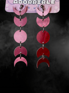 Adorrible Moon Phases earrings featuring silver crescent moon and full moon charms on delicate hooks.