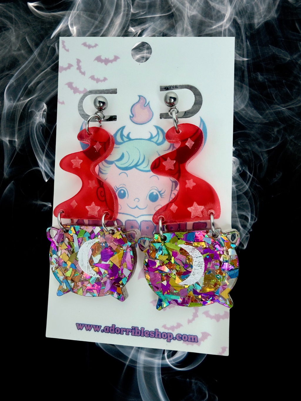 Adorrible witch’s cauldron earrings featuring small black cauldrons with detailed handles and bubbling potion design.