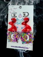 Adorrible witch’s cauldron earrings featuring small black cauldrons with detailed handles and bubbling potion design.