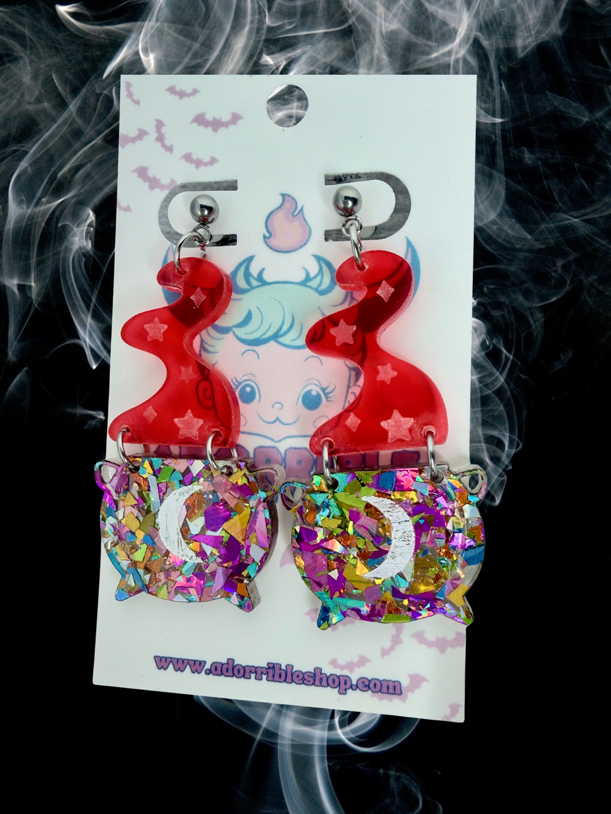 Adorrible witch’s cauldron earrings featuring small black cauldrons with detailed handles and bubbling potion design.