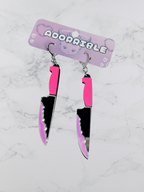 Layered bloody knife dangle earrings by Adorrible featuring dagger-shaped earrings with layered design and dark, edgy style.