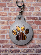 Adorrible paw keychain featuring a cute, detailed paw print design on a metal keyring.