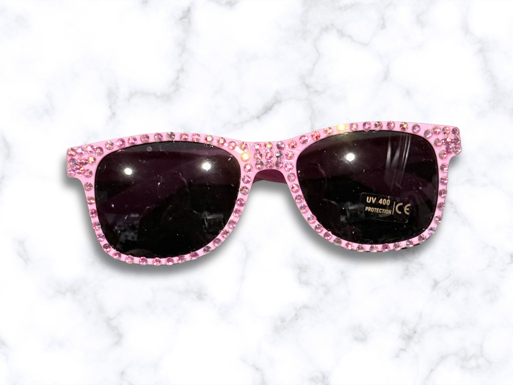 Adorrible rhinestones sunglasses with sparkling embellished frames and dark tinted lenses for a stylish, glamorous look.
