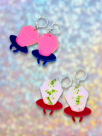Adorrible Ring Pop dangle earrings featuring colorful, candy-inspired design with shiny metal hooks.