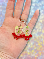 Adorrible Ring Pop dangle earrings featuring colorful, candy-inspired design with shiny metal hooks.