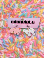 Adorrible animal cookies dangle earrings featuring colorful cookie-shaped charms on silver hooks.