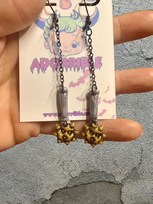 Handcrafted clay earrings inspired by the intricate beauty of a mace, perfect for unique style and charm