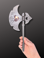 Adorrible Battle Axe wall hanging art with detailed design, mounted on a wall for medieval or fantasy-inspired decor.