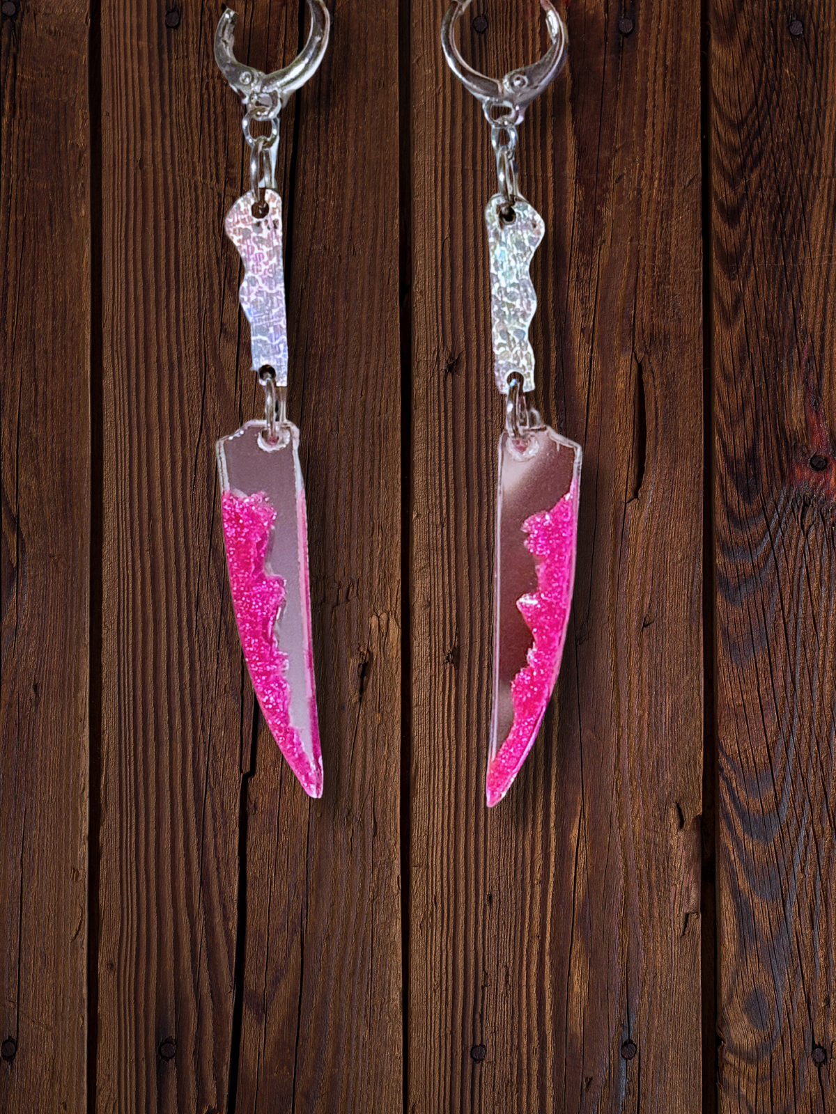 Adorrible Two Part Bloody Knife earrings featuring realistic silver and blood-red details, perfect for edgy fashion styles.
