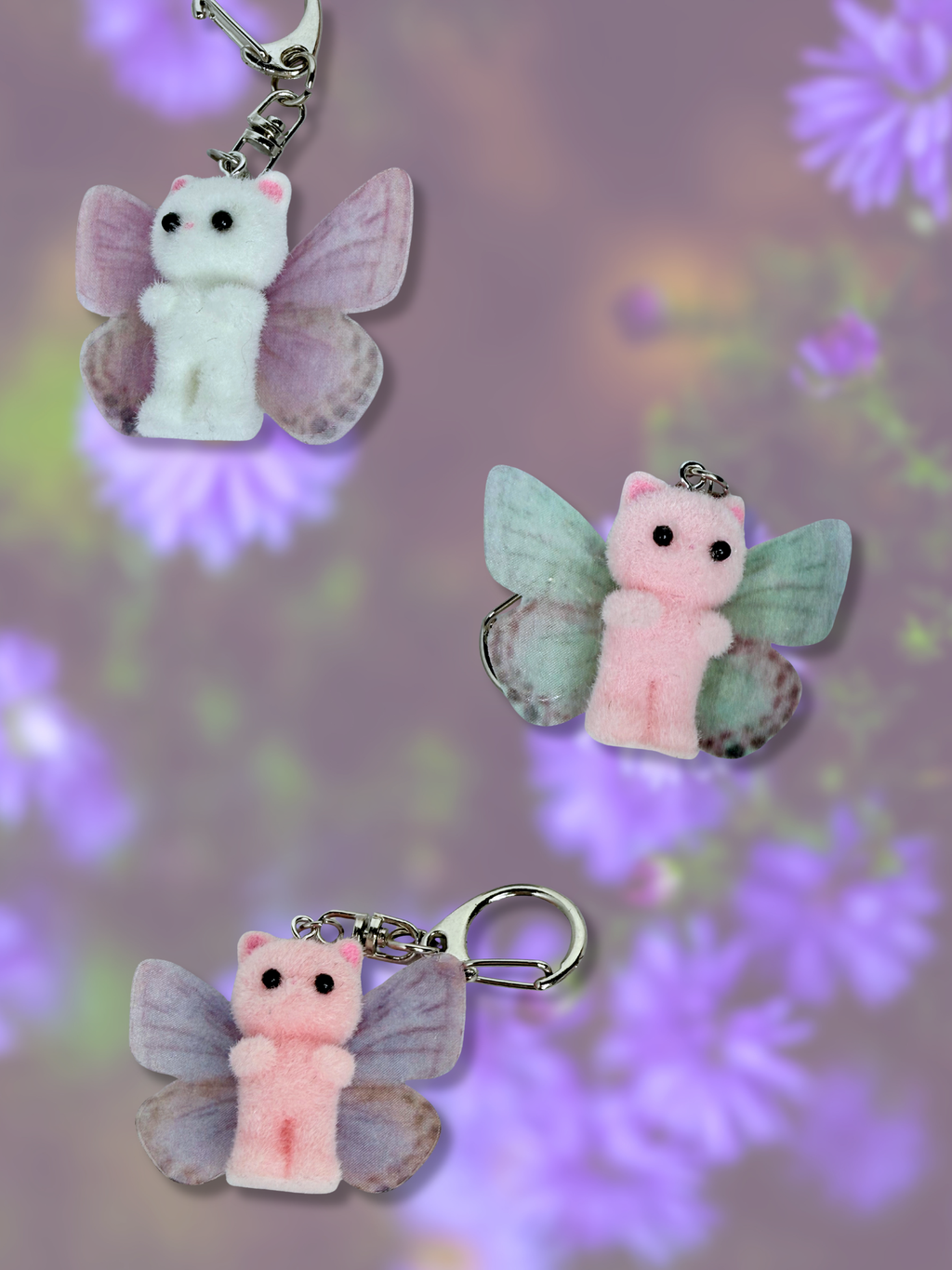 Adorrible butterfly wing cat keychain featuring a colorful butterfly wing design on a metal keyring.