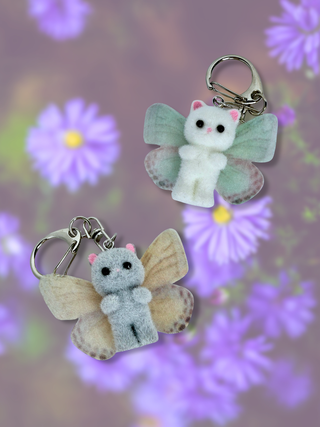 Adorrible butterfly wing cat keychain featuring a colorful, detailed butterfly wing design attached to a metal keyring.