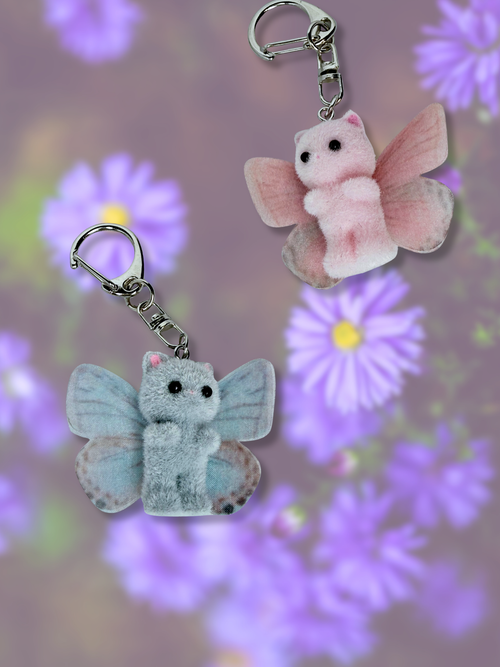 Adorrible butterfly wing cat keychain featuring colorful, detailed butterfly wings and a cute cat charm attached.
