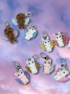 Adorrible Cupid Cuties animal keychain with wings, featuring colorful, cute winged animal designs on a metal keyring.
