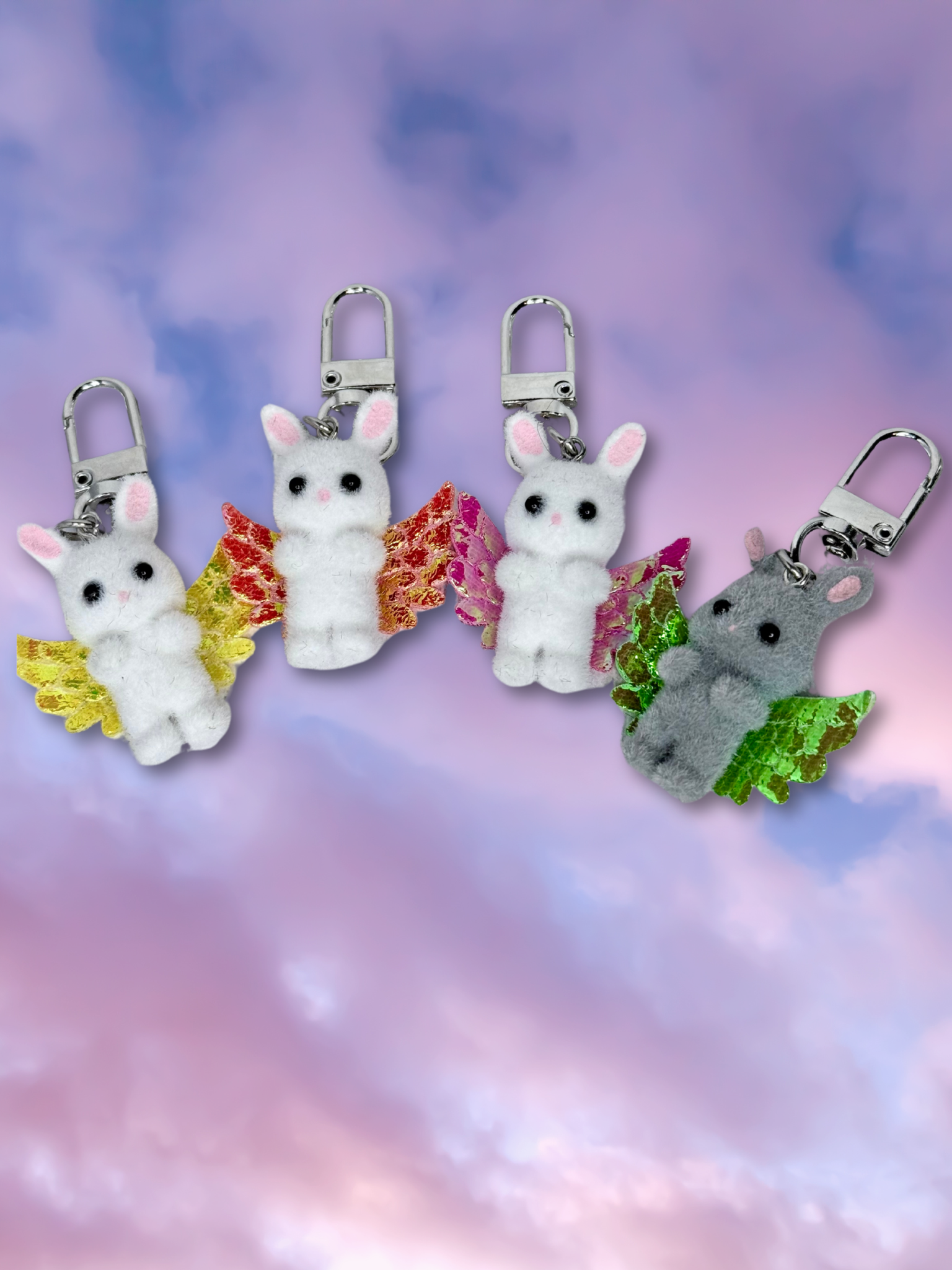 Adorrible Cupid Cuties animals with wings keychain featuring colorful winged animal charms on a metal keyring.
