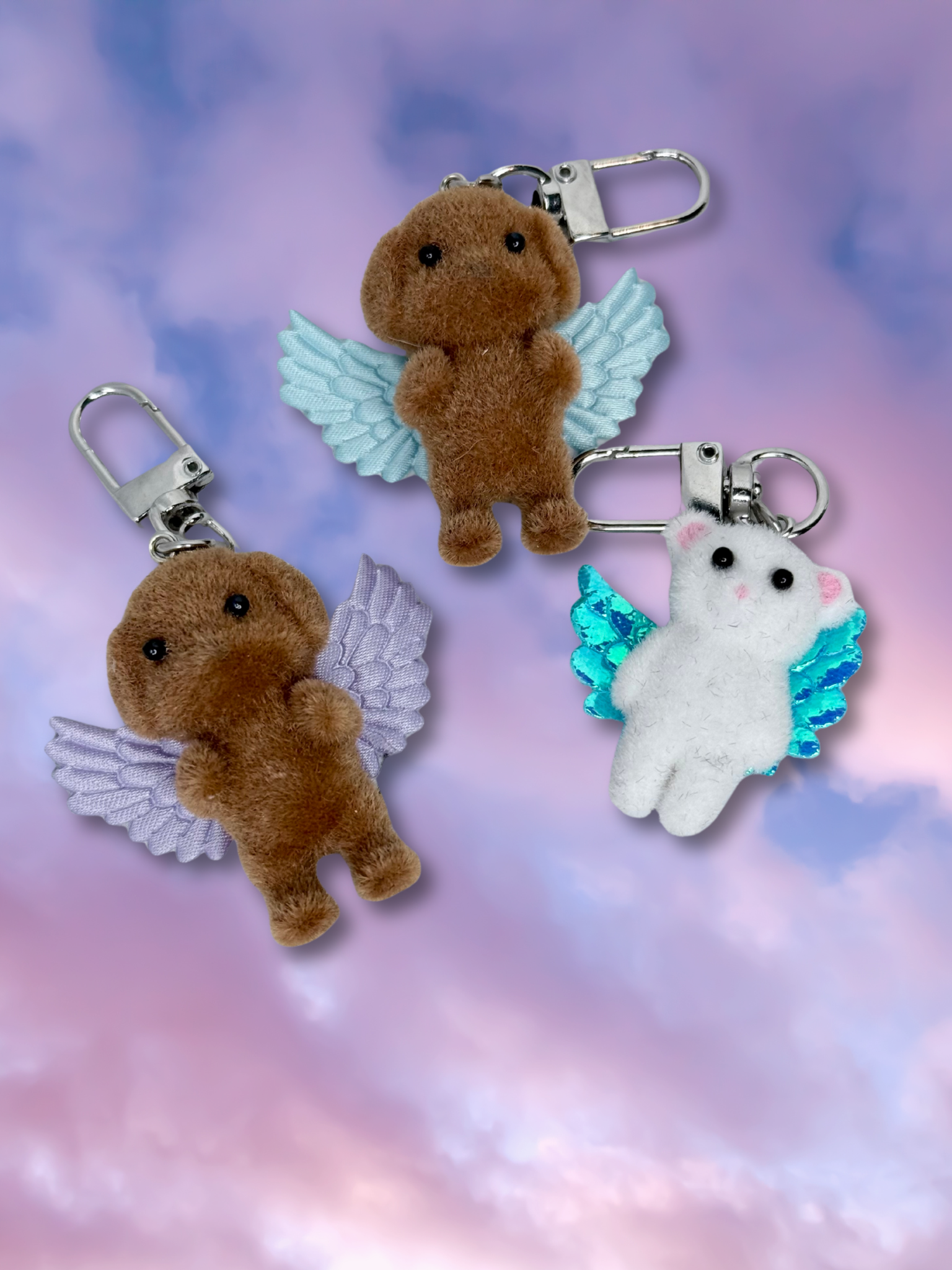 Adorrible Cupid Cuties animals with wings keychain featuring colorful, cute winged animal charms on a silver keyring