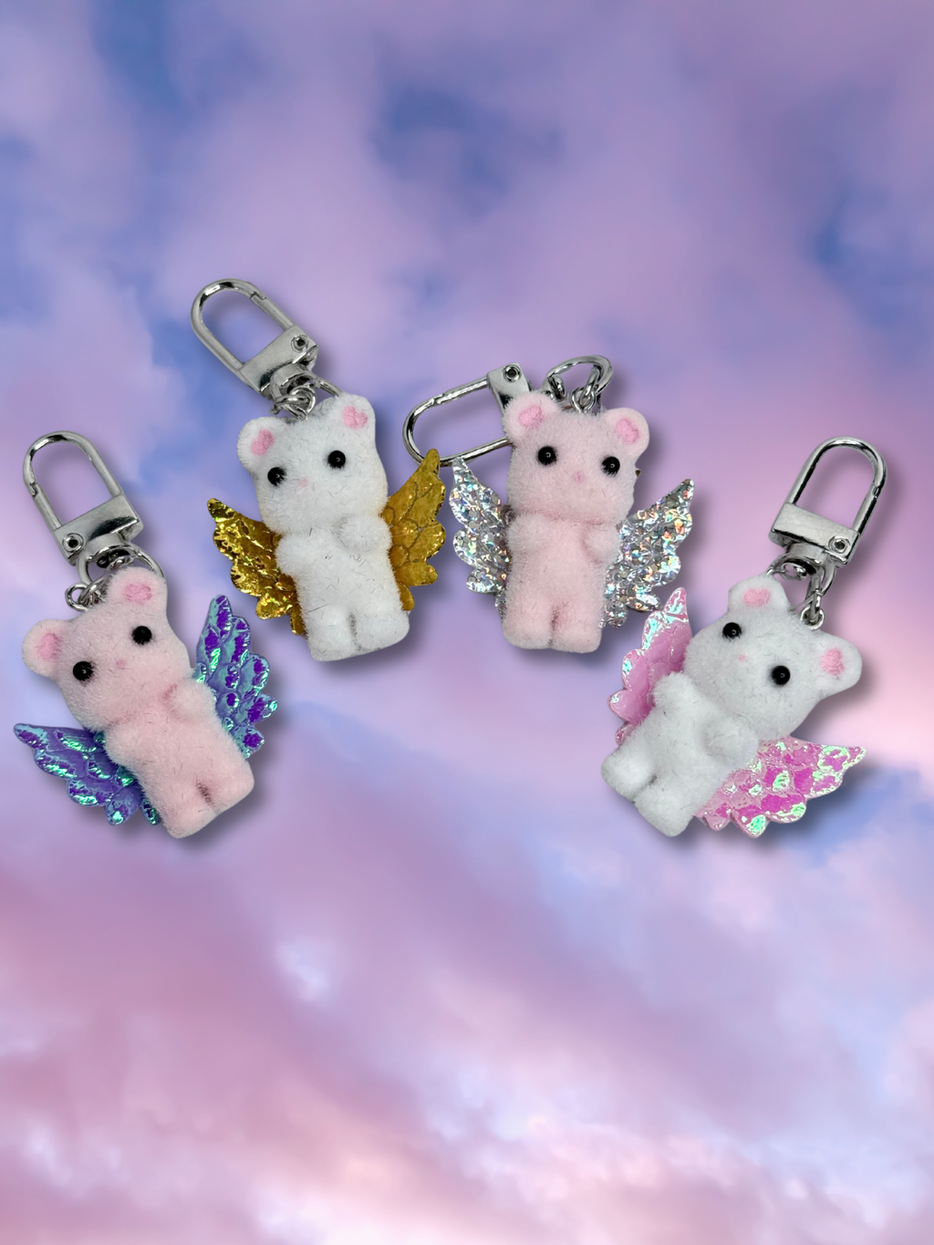 Adorrible Cupid Cuties animal keychain with tiny wings, featuring colorful, cute animal designs on a silver metal keyring.