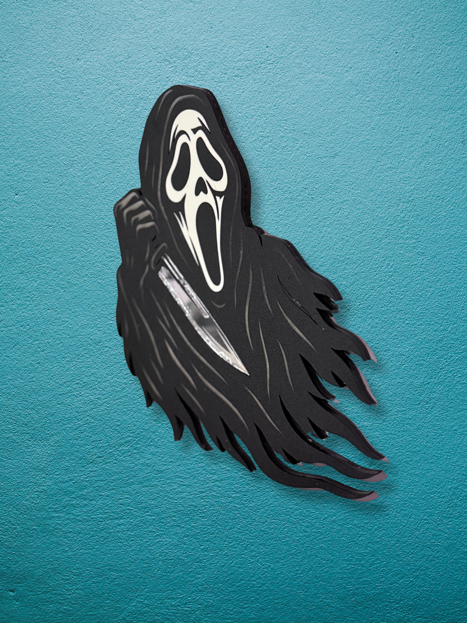 Ghostface wall art by Adorrible featuring a spooky, detailed illustration of the iconic horror character on a black background.