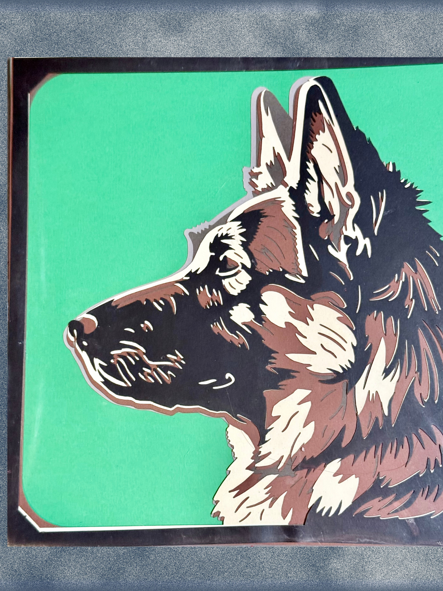 Adorrible dog layered paper 3D art with intricate paper cut designs showcasing a detailed dog figure.