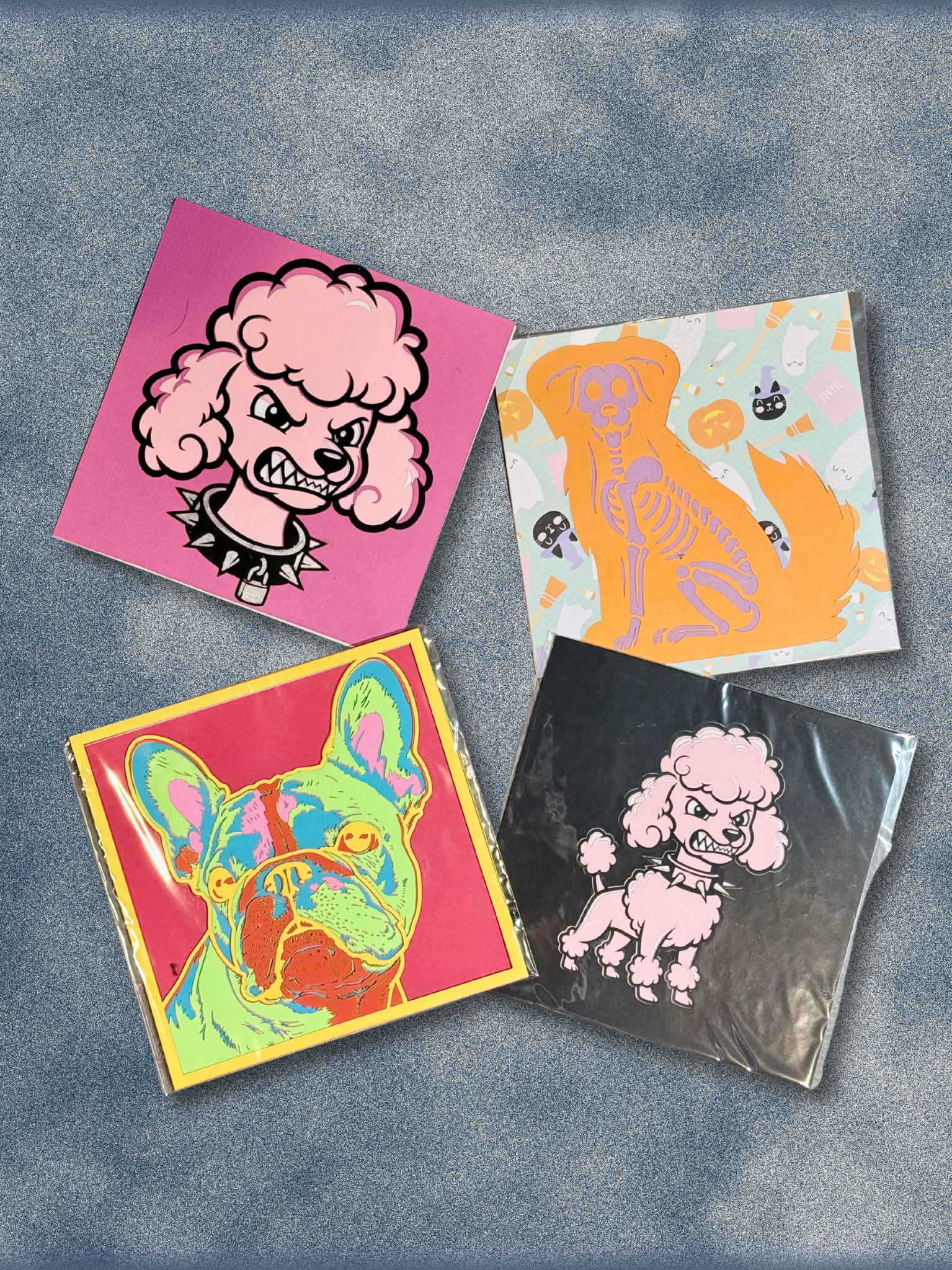 Adorrible dog layered paper 3D art display with intricate paper cut designs on white background.