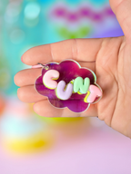 Iridescent cloud keychain with bubble letter design from Adorrible, featuring shiny, colorful cloud-shaped charm on a metal keyring.