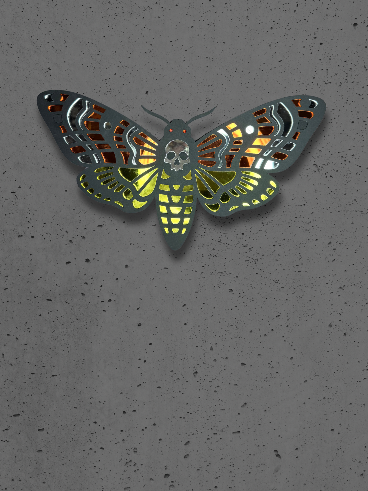 Adorrible Mirrored Moth Wall Art featuring a detailed, symmetrical moth design with reflective surface on a white background.
